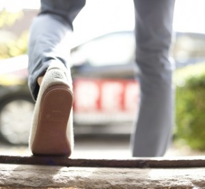 person walking down steps