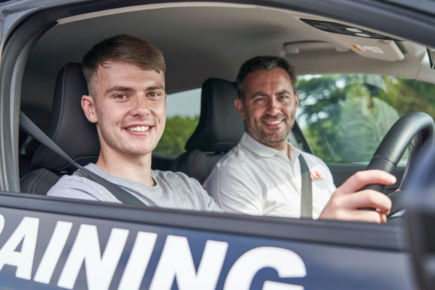 Instructor and learner smiling